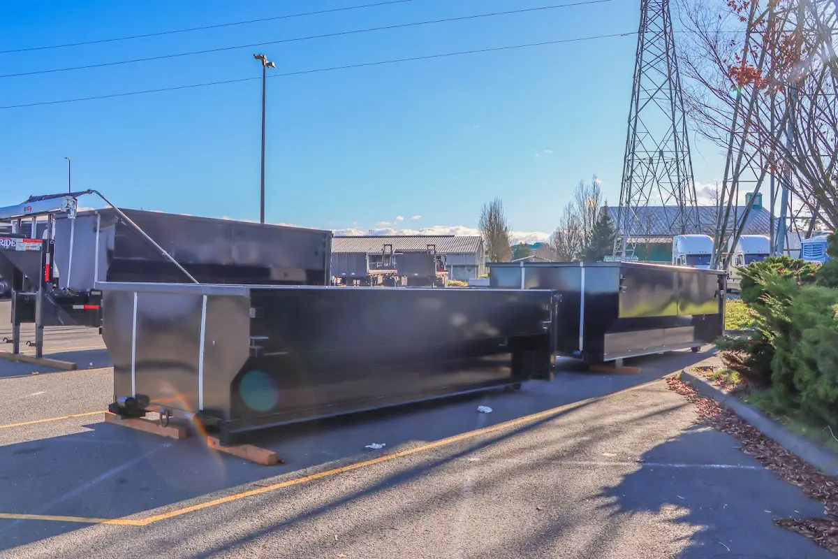 Roll-off dumpster ready for waste disposal at job site for 12 Yard Dumpster Rental in Loudon